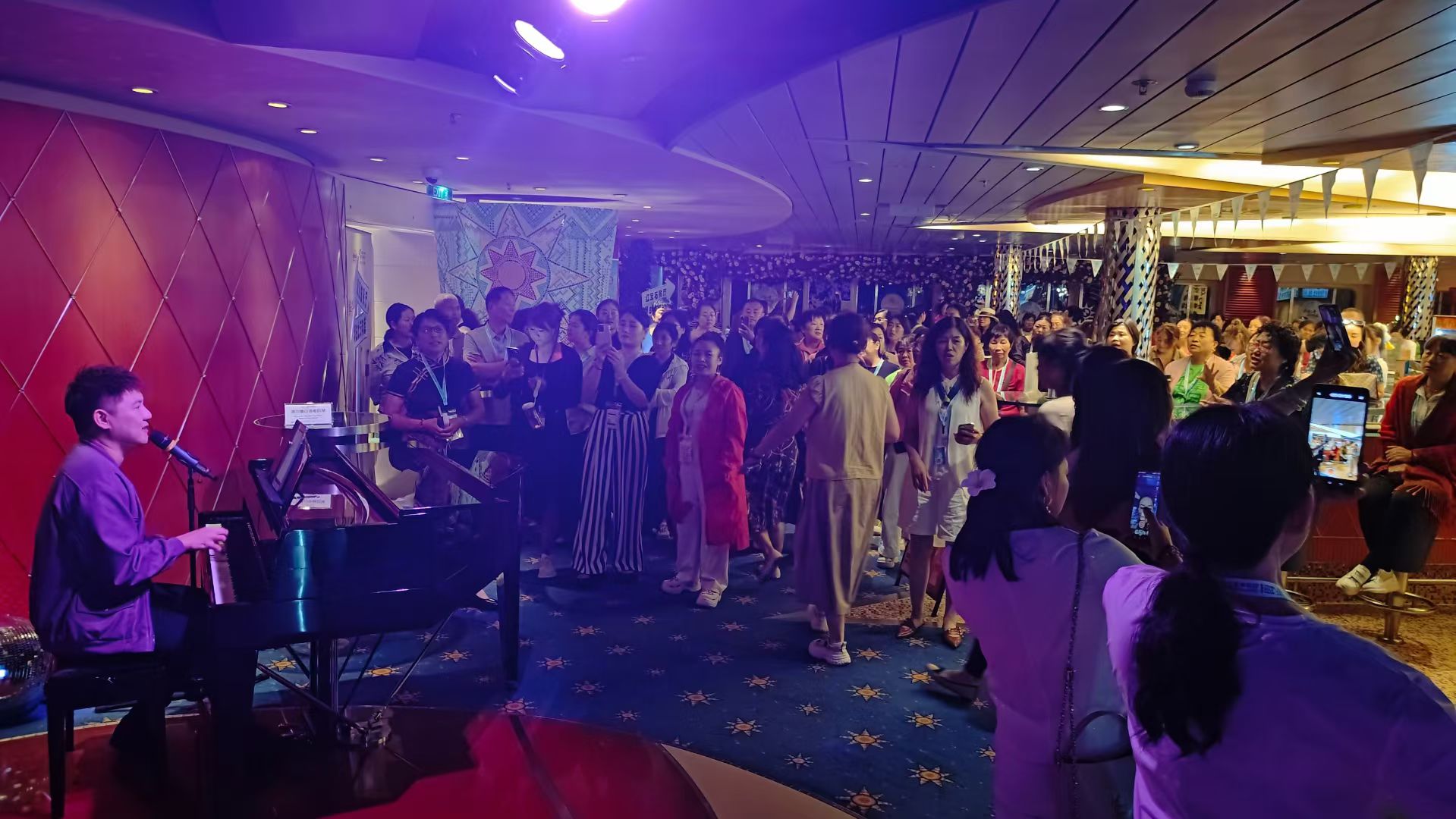 Bryan.T performing to cruise audience